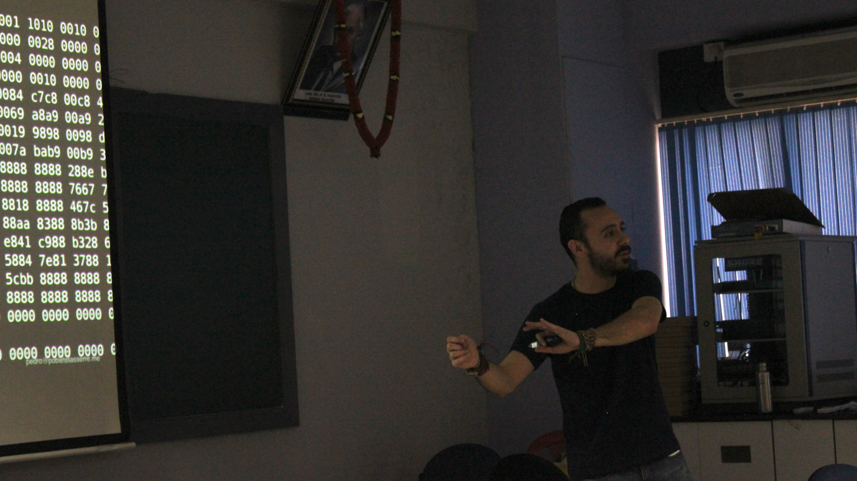 Picture of Pedro giving a presentation